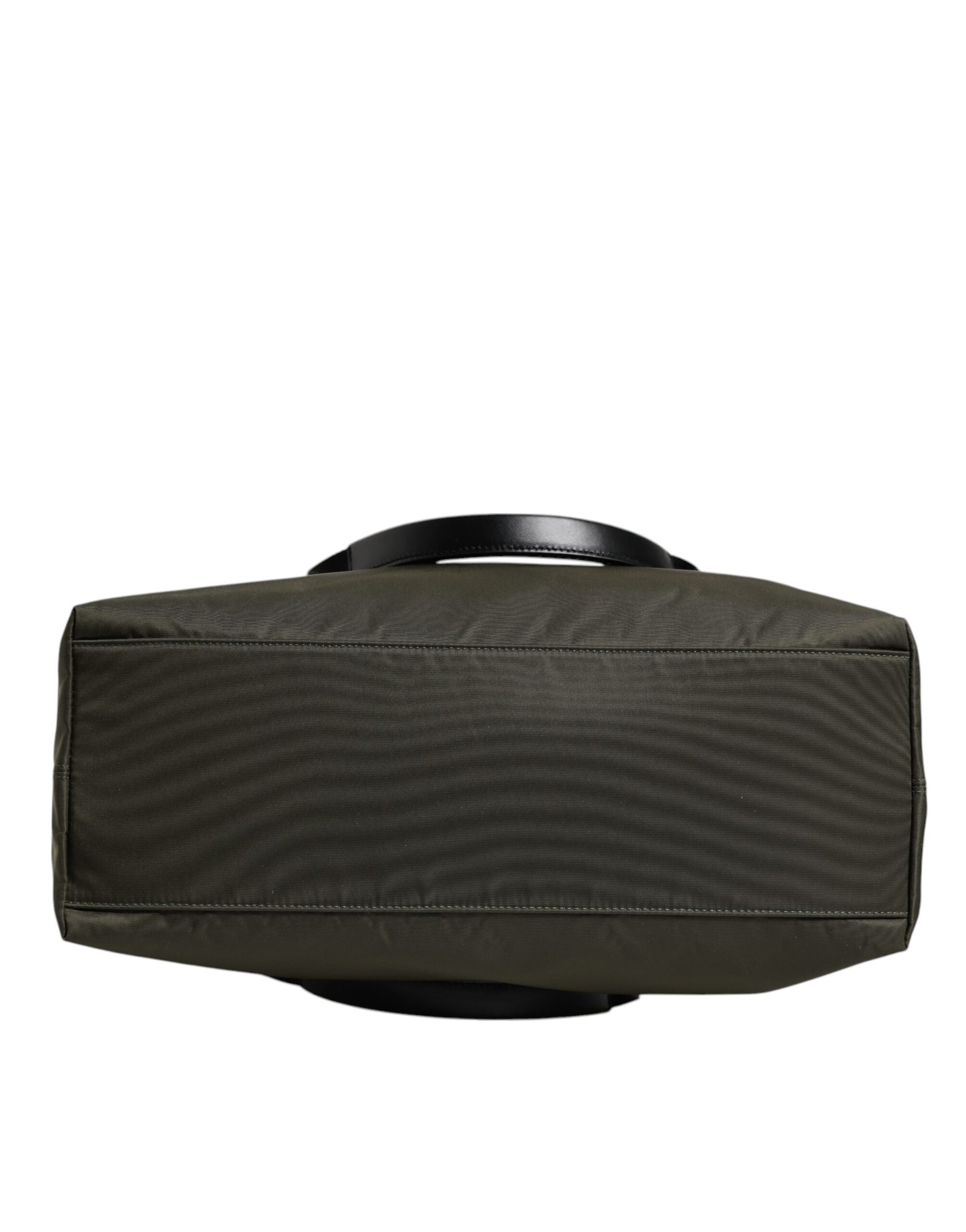 Tote Bag by Dolce & Gabbana for men in calf leather & nylon military-green features a jet-set Calf Leather Nylon Tote Bag design, complete with a secure , ample , and versatile shoulder-strap & handle for a jet-set look.