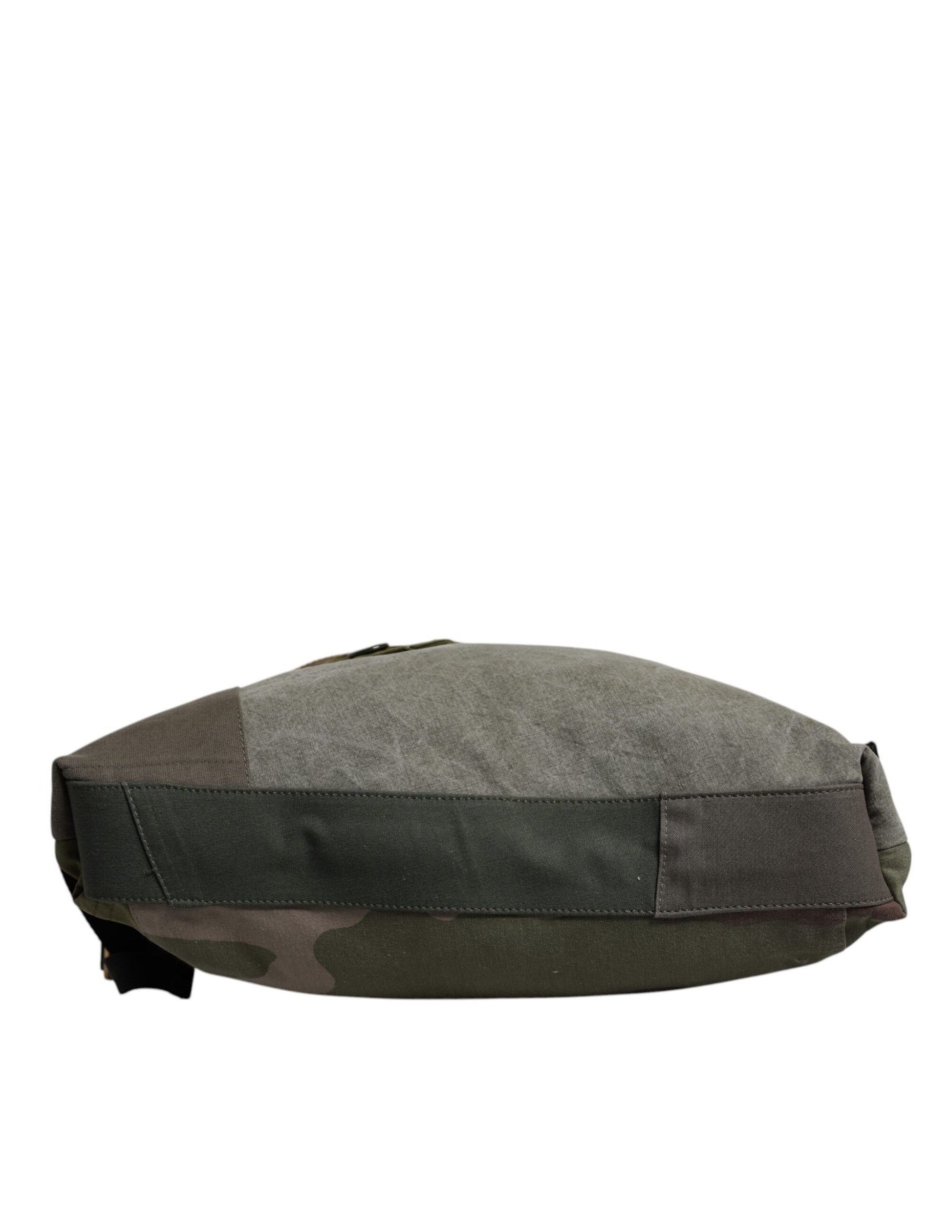 Large Drawstring Rucksack Backpack by Dolce & Gabbana for men in calf leather & cotton military-green, camouflage & patchwork presents a stately Calf Leather Cotton Large Drawstring Rucksack Backpack design, showcasing a secure drawstring with ample internal-pockets and versatile backpack-strap for a stately finish.