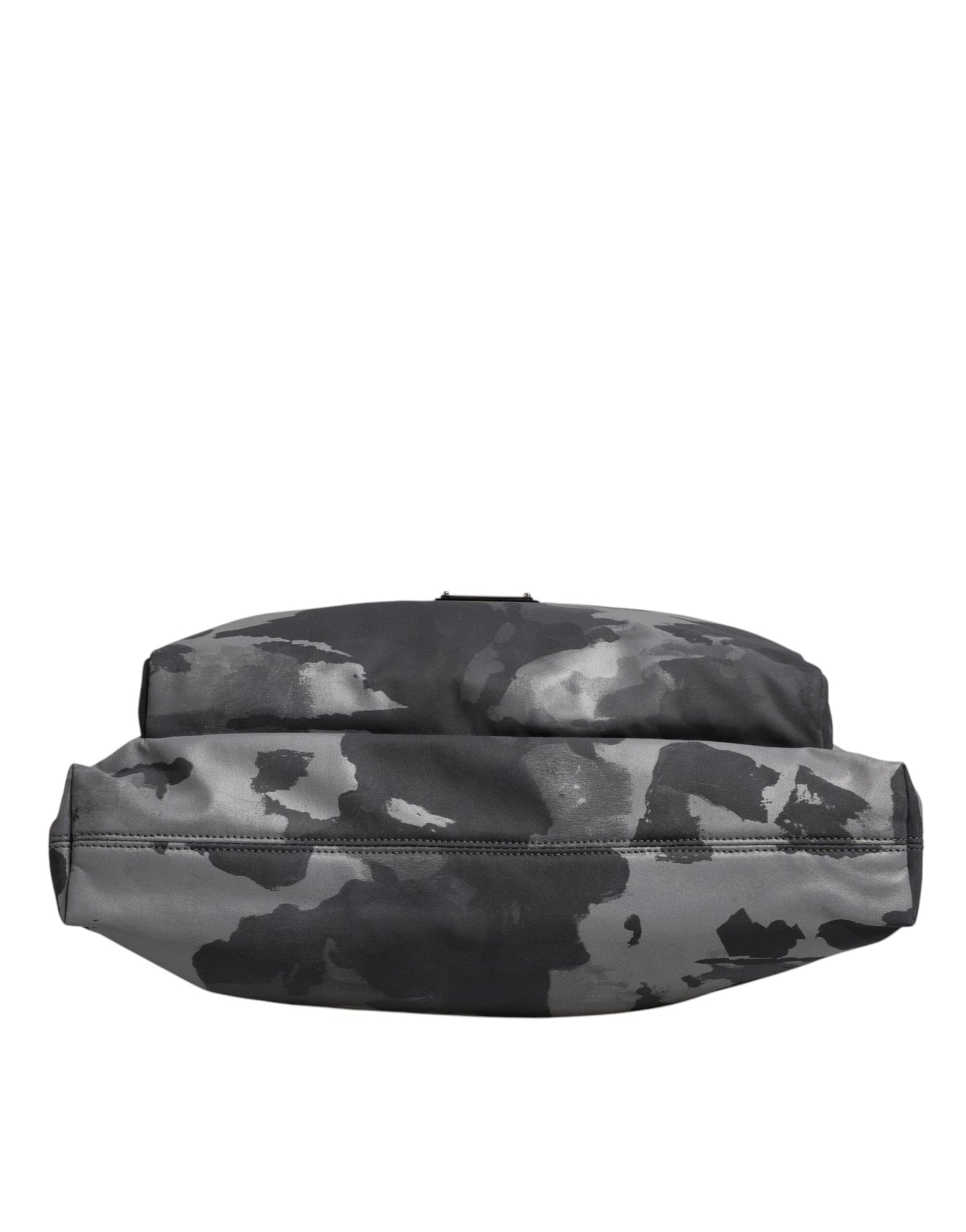 This Tote Bag by Dolce & Gabbana for men in poly cotton & leather gray, patterned & camouflage features an jet-set Poly Cotton Leather Tote Bag design with a secure zipper, ample built-in-compartments, and jet-set handle.