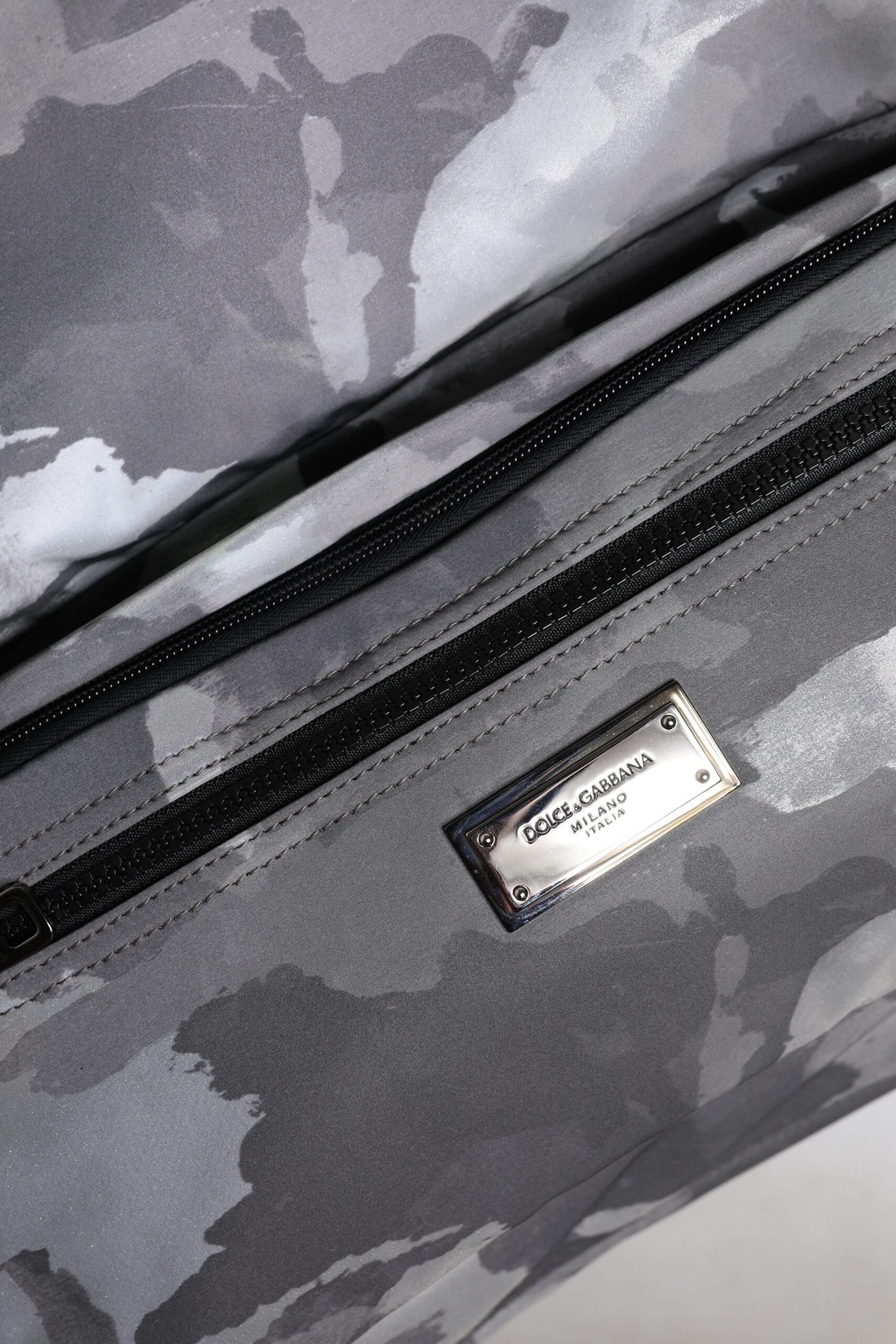 Tote Bag by Dolce & Gabbana for men in poly cotton & leather gray, patterned & camouflage features a jet-set sophisticated Poly Cotton Leather Tote Bag design with a secure zipper, ample built-in-compartments, and versatile handle for a jet-set sophisticated finish.