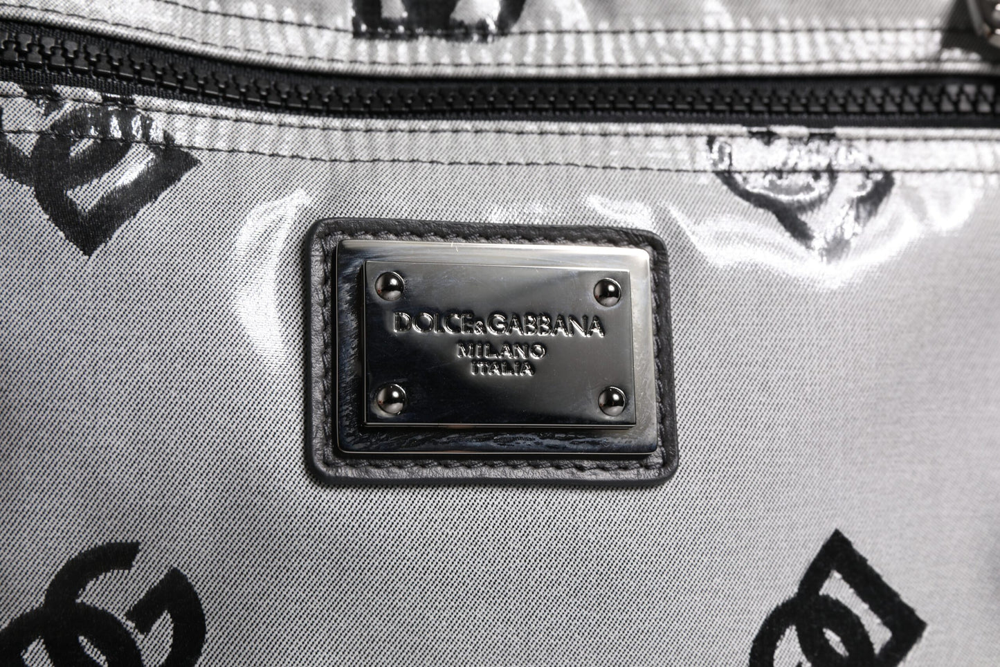 Backpack by Dolce & Gabbana for men in pu leather & cotton black, gray & signature features a refined silhouette, showcasing the PU Leather Cotton Backpack design with a secure zipper, ample , and versatile shoulder-strap & backpack-strap.