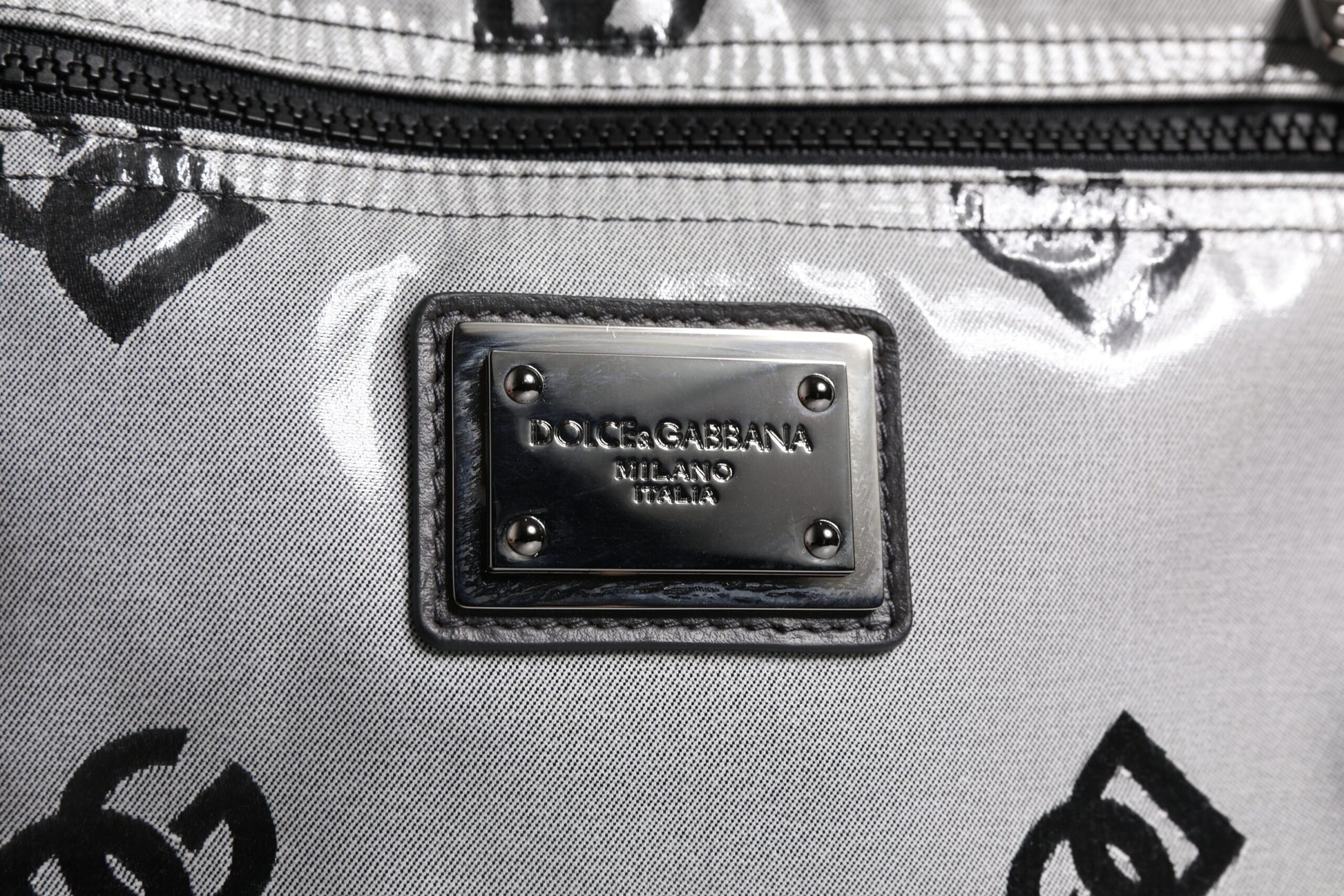 Backpack by Dolce & Gabbana for men in pu leather & cotton black, gray & signature features a refined silhouette, showcasing the PU Leather Cotton Backpack design with a secure zipper, ample , and versatile shoulder-strap & backpack-strap.