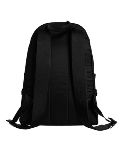 Backpack by Dolce & Gabbana for men in nylon black & signature features a refined silhouette, showcasing the Vulcano Nylon Backpack design with a secure zipper, ample , and versatile shoulder-strap & backpack-strap.