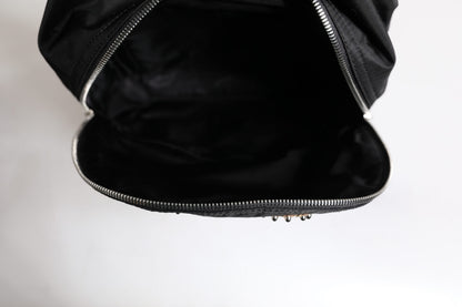Backpack by Dolce & Gabbana for men in nylon black & signature presents a stately Vulcano Nylon Backpack design, showcasing a secure zipper with ample and versatile shoulder-strap & backpack-strap for a stately finish.