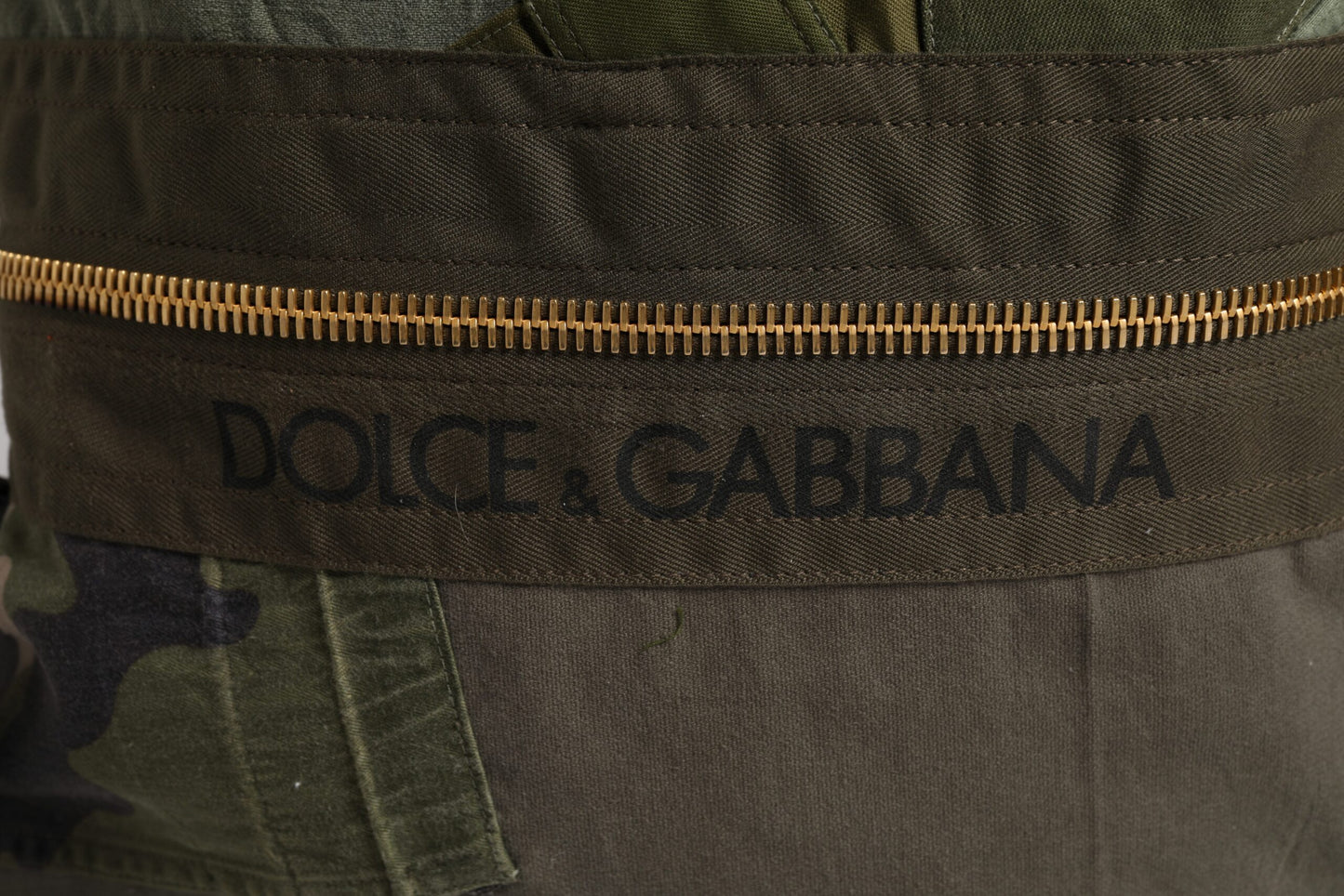 Large Drawstring Rucksack Backpack by Dolce & Gabbana for men in calf leather & cotton military-green, camouflage & patchwork presents a stately Calf Leather Cotton Large Drawstring Rucksack Backpack design, showcasing a secure drawstring with ample internal-pockets and versatile backpack-strap for a stately finish.