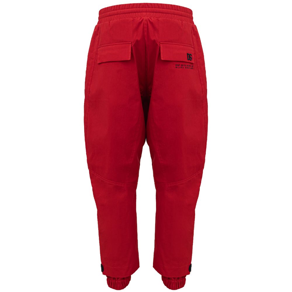Trousers by Dolce & Gabbana for men in polyamide red & print presents a smart silhouette, meticulously detailed with a smart wide, a smart long, and a smart .