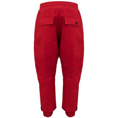 Trousers by Dolce & Gabbana for men in polyamide red & print presents a smart silhouette, meticulously detailed with a smart wide, a smart long, and a smart .
