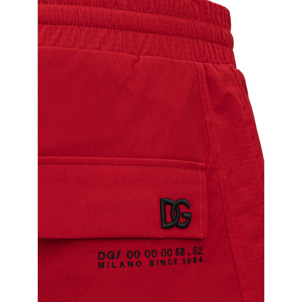 Trousers by Dolce & Gabbana for men in polyamide red & print presents a perennial silhouette, meticulously tailored with a wide cut, long finish, and an elegant .