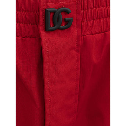 Trousers by Dolce & Gabbana for men in polyamide red & print features a tailored silhouette with a tailored wide, defined by its long and a sophisticated .
