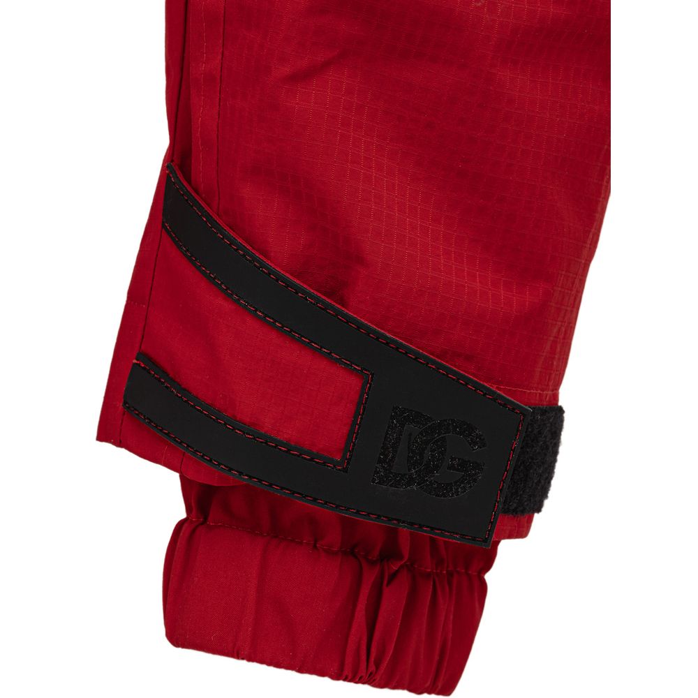 Trousers by Dolce & Gabbana for men in polyamide red & print presents a perennial silhouette, meticulously tailored with a wide cut, long finish, and an elegant .