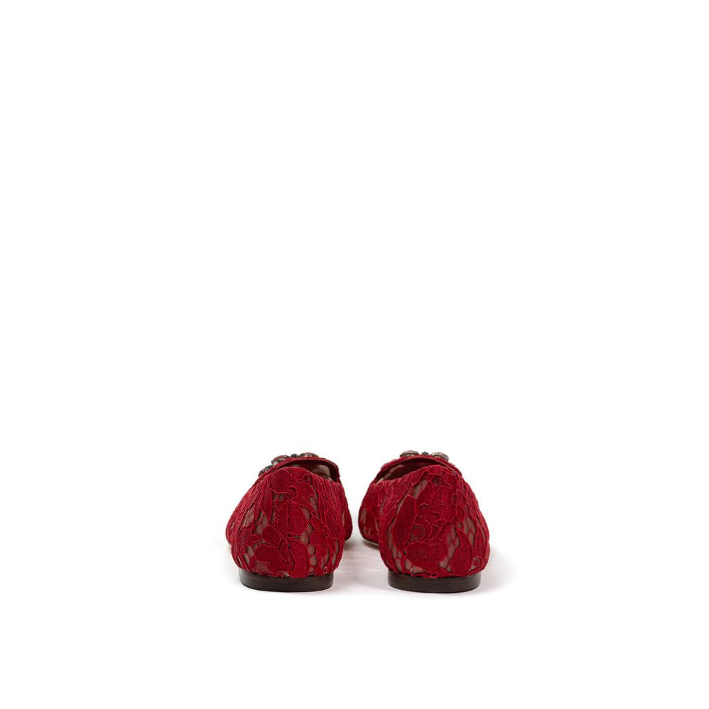 Flat Shoes by Dolce & Gabbana for women in viscose red & signature showcases a dynamic silhouette, artfully capturing Women's Viscose Flat Shoes through its distinctive and elegant .