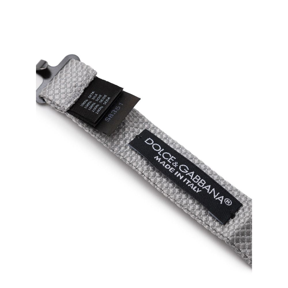 Necktie by Dolce & Gabbana for men in silk silver features a distinguished silhouette, perfectly showcasing the distinguished details of Silk Necktie.