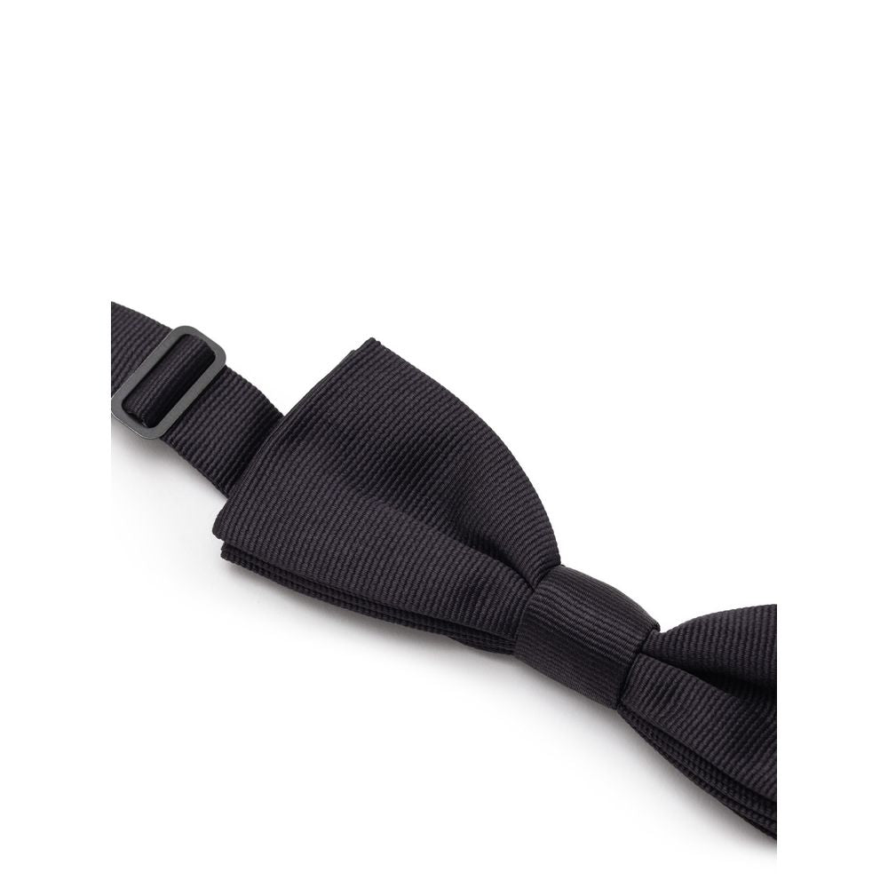 Necktie by Dolce & Gabbana for men in silk black & striped showcases a stately silhouette, expertly detailed with a stately finish that perfectly captures the sophisticated essence of the Silk Necktie.