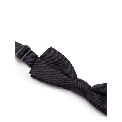 Necktie by Dolce & Gabbana for men in silk black & striped showcases a stately silhouette, expertly detailed with a stately finish that perfectly captures the sophisticated essence of the Silk Necktie.