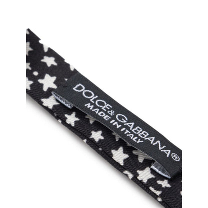 Necktie by Dolce & Gabbana for men in silk black, white & print showcases a stately silhouette, expertly detailed with a stately finish that perfectly captures the sophisticated essence of the Star Silk Necktie.