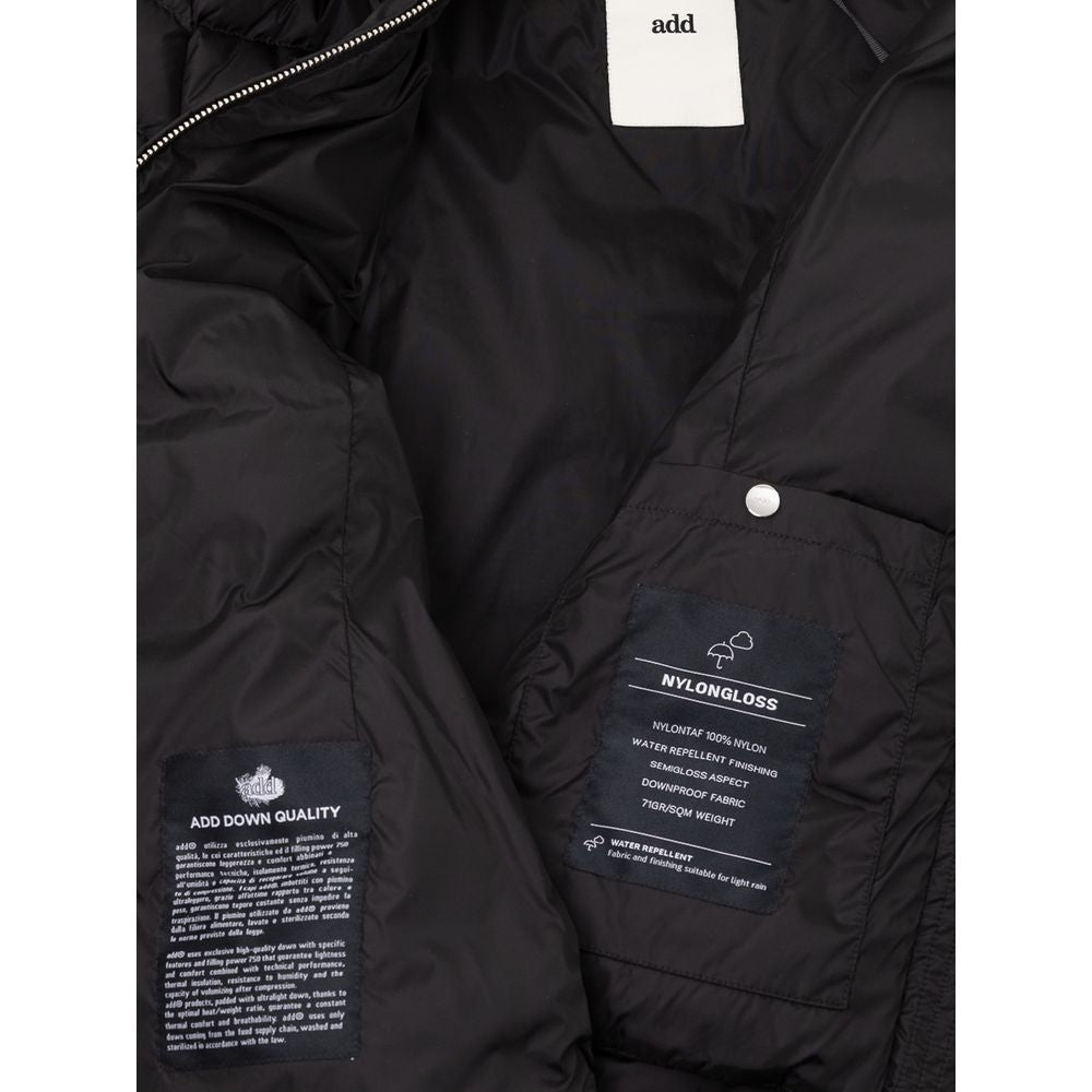 This Hooded Puffer Jacket by Add for women in polyamide & duck down black exhibits a edgy silhouette, meticulously detailed with functional lightweight, pockets, hooded & insulated and a edgy hooded neckline for a edgy finish.