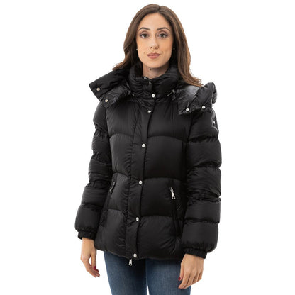This Hooded Puffer Jacket by Add for women in polyamide & duck down black exhibits a edgy silhouette, meticulously detailed with functional lightweight, pockets, hooded & insulated and a edgy hooded neckline for a edgy finish.