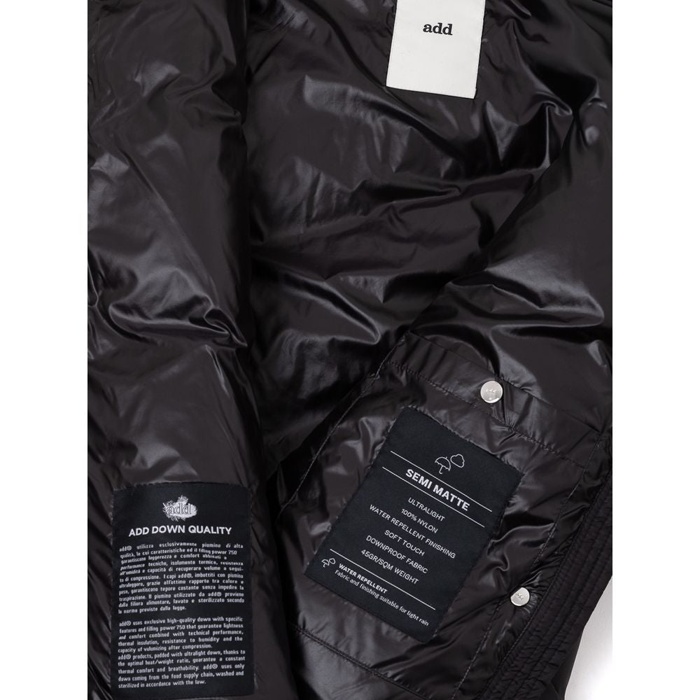 Hooded Puffer Jacket by Add for women in polyamide & duck down black presents a effortlessly chic silhouette, showcasing a sophisticated hooded neckline and premium lightweight, pockets, hooded & insulated for a truly effortlessly chic finish.
