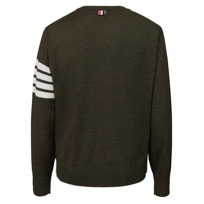 Sweater by Thom Browne for men in lana wool green showcases a discreet silhouette, finished with a discreet and for a discreet look.