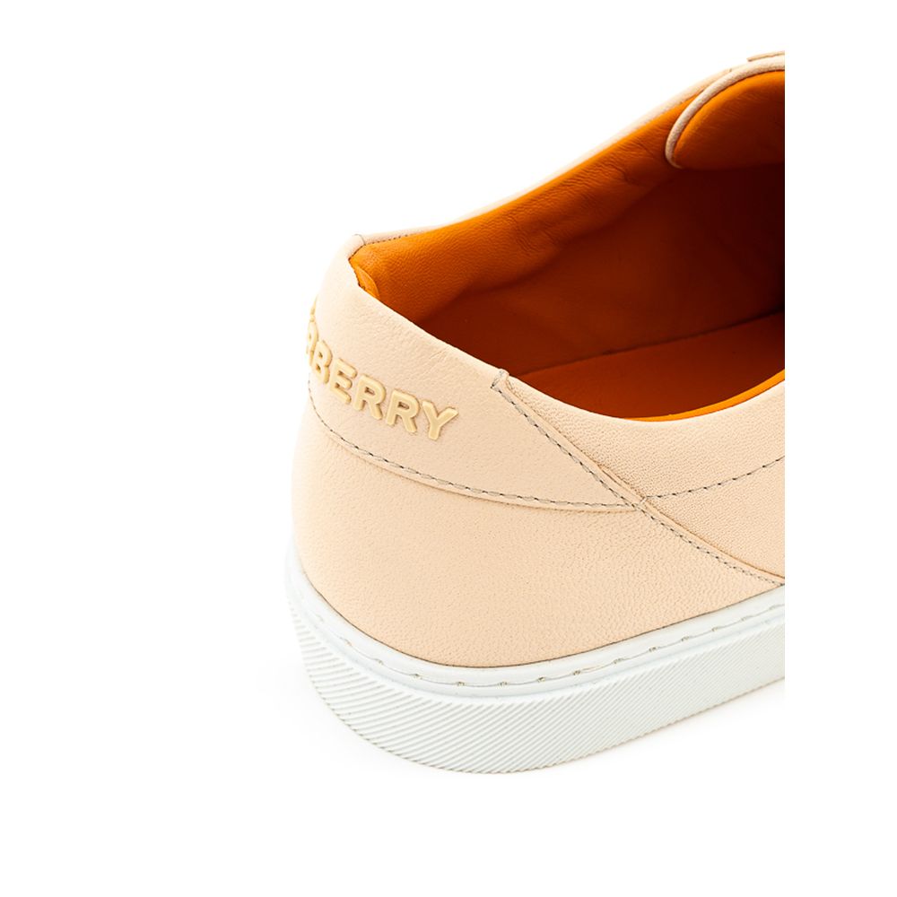 Sneakers by Burberry for women in leather & rubber pink, white & signature features an timeless silhouette from the Women's Casual Leather & Rubber Sneakers collection, showcasing a signature casual style with an timeless finish.