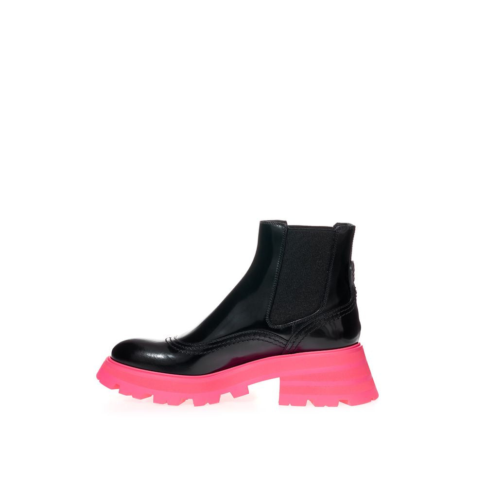 Boots by Alexander McQueen for women in leather black showcases a ergonomic silhouette from the Women's Leather Boots collection, featuring a ergonomic and a ergonomic .