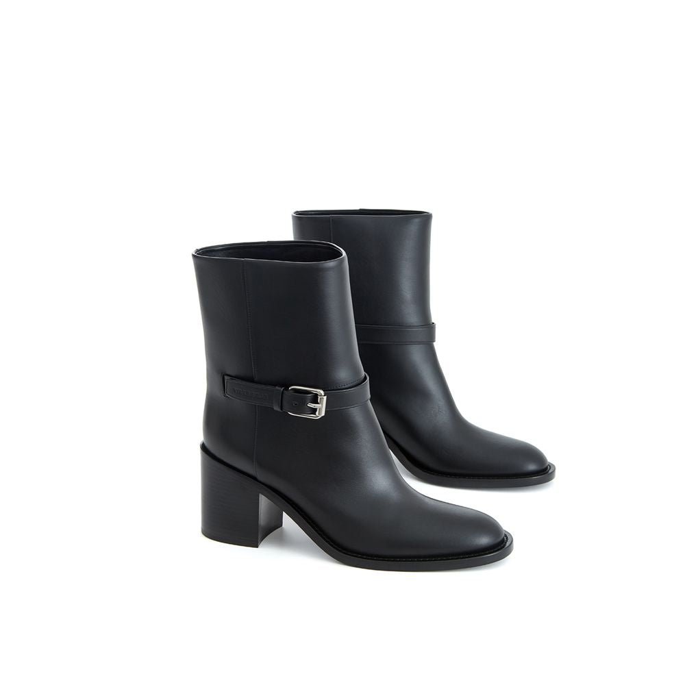 Ankle Strap Boots by Burberry for women in leather black & print features an dynamic silhouette, showcasing the dynamic Women's Leather Ankle Strap Boots design with its distinctive and elegant round toe style.