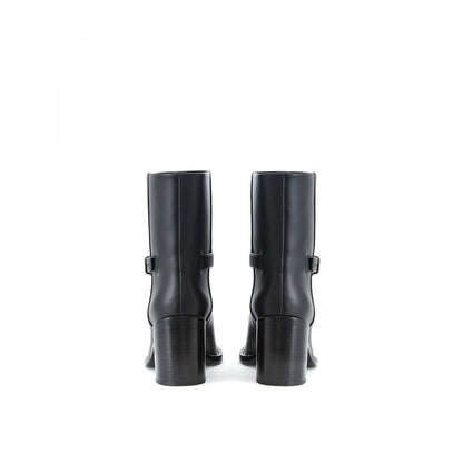 Ankle Strap Boots by Burberry for women in leather black & print features an effortless chic silhouette from the Women's Leather Ankle Strap Boots collection, showcasing a effortless chic and refined round toe style for an effortless chic look.