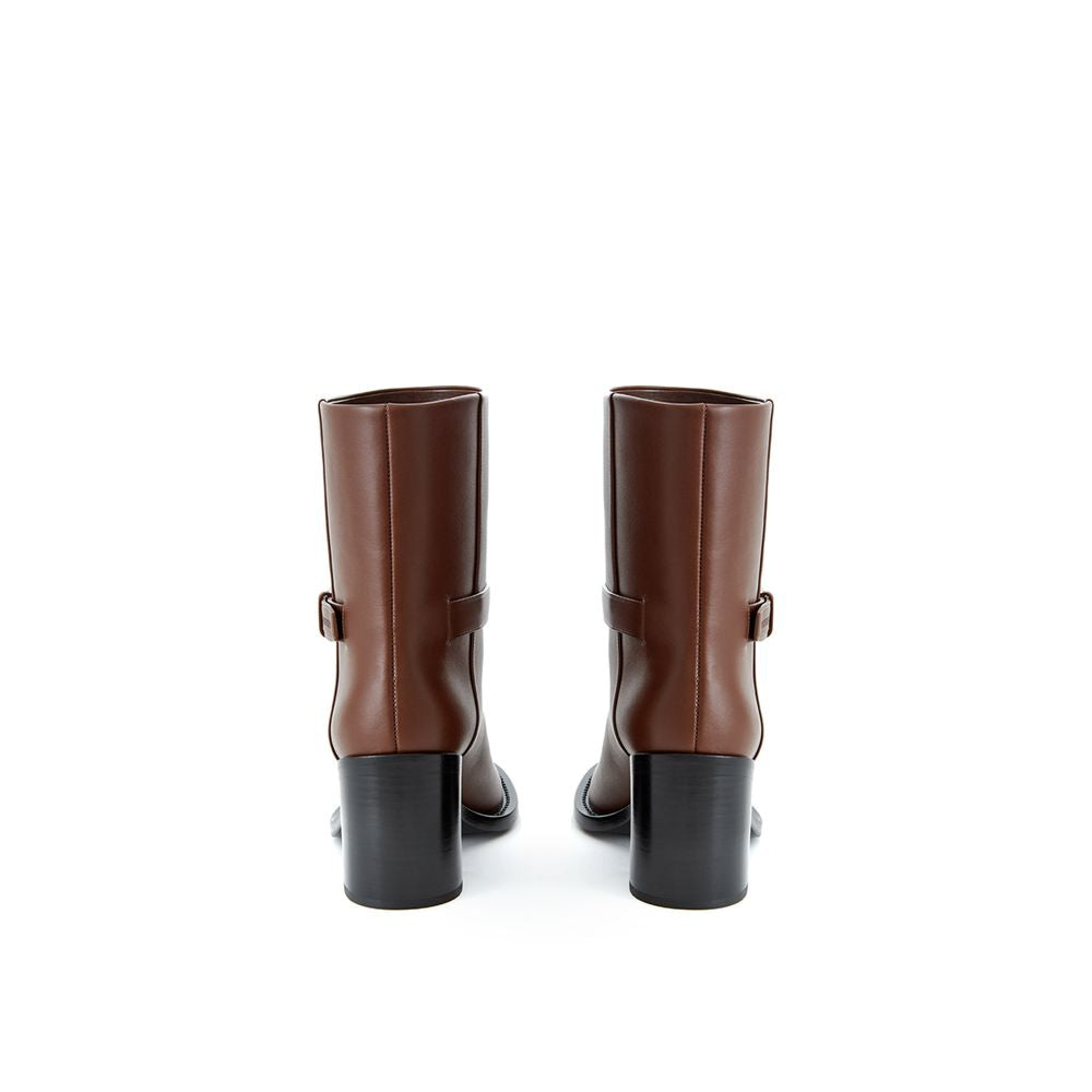 Boots by Burberry for women in leather brown showcases a ergonomic silhouette from the Women's Leather Boots collection, featuring a ergonomic and a ergonomic .