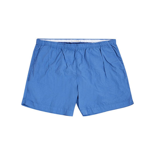 Swim Shorts by C.P. Company for men in polyamide blue presents a sculptural silhouette, showcasing the sculptural Essence Men's Polyamide Swim Shorts design with a refined cut for a premium, sophisticated look.