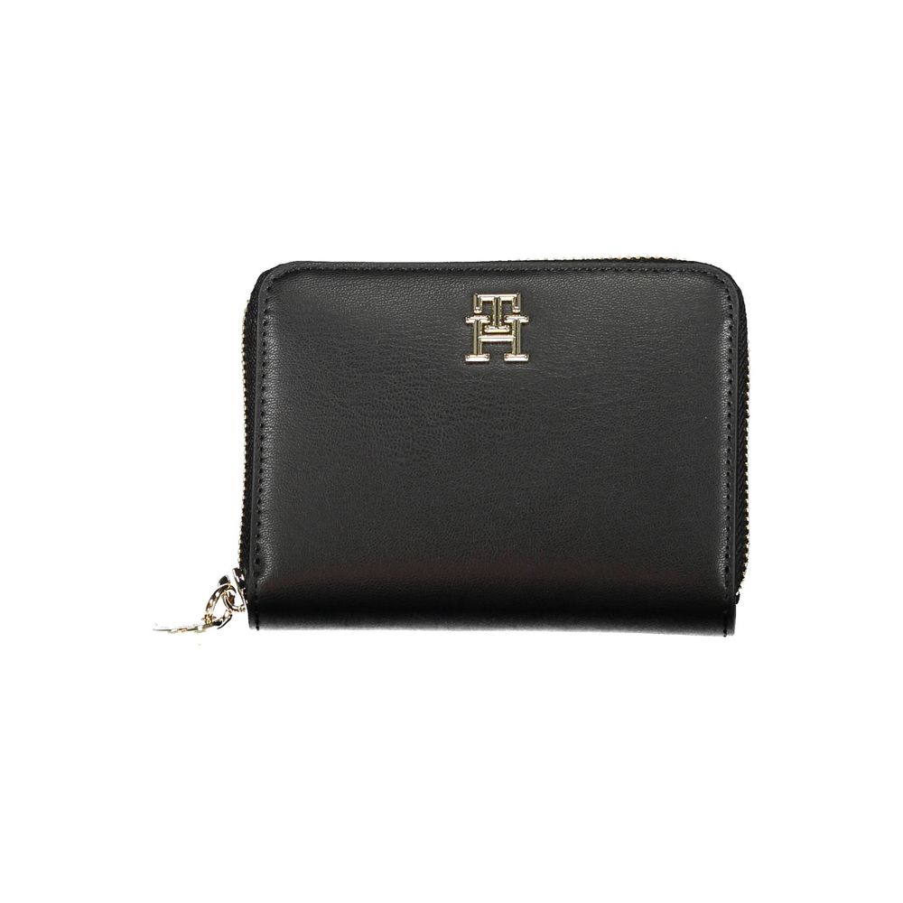 Cardholder Wallet by Tommy Hilfiger for women in polyethylene faux leather black features a streamlined silhouette, showcasing the streamlined Polyethylene Faux Leather Cardholder Wallet design with sophisticated card-organization compact-design zip-around coin-purse for a premium look.