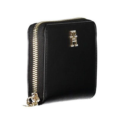 Cardholder Wallet by Tommy Hilfiger for women in polyethylene faux leather black showcases a refined silhouette, artfully detailed with the signature style of the Polyethylene Faux Leather Cardholder Wallet and functional card-organization compact-design zip-around coin-purse.