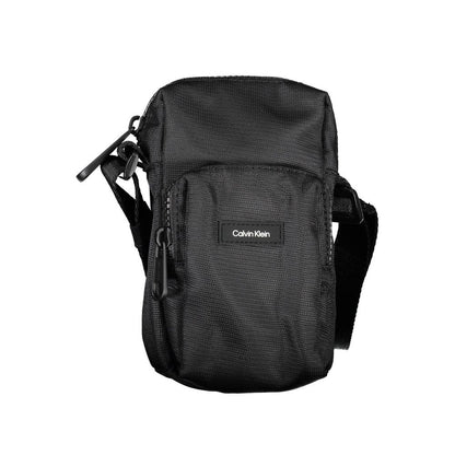 Shoulder Bag by Calvin Klein for men in polyester & polyethylene black features a effortless chic silhouette with a secure zipper, ample external-pockets, and versatile shoulder-strap & adjustable-strap for a effortless chic finish.