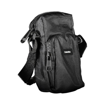Shoulder Bag by Calvin Klein for men in polyester & polyethylene black presents a statuesque silhouette, showcasing a secure zipper and statuesque external-pockets with versatile shoulder-strap & adjustable-strap for a sophisticated look.