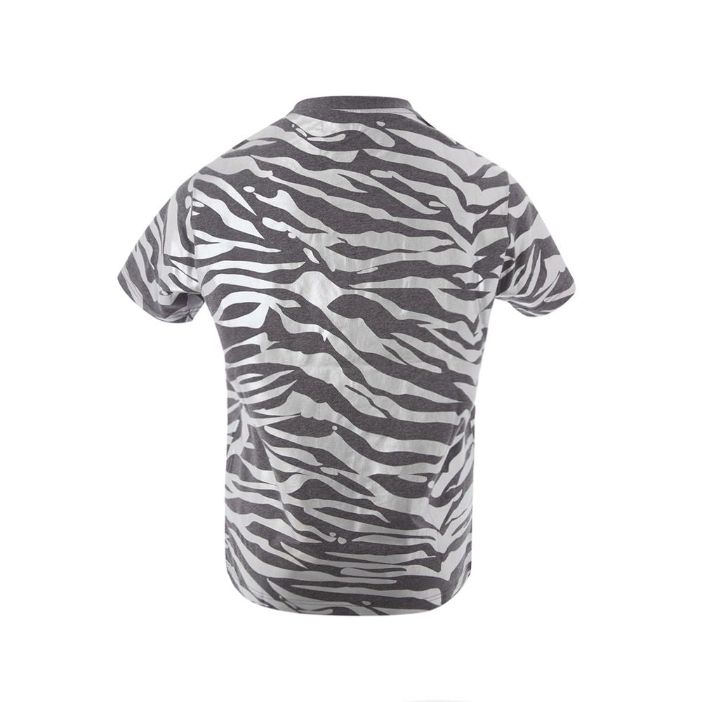 T-Shirt by Kenzo for women in cotton multicolor & print showcases a dramatic silhouette, elegantly detailed with a dramatic round neckline and for a truly dramatic finish.