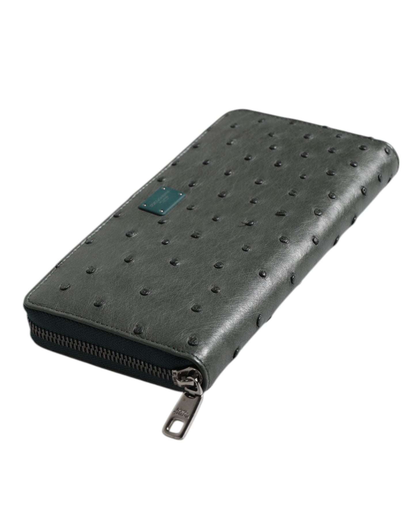 Cardholder Wallet by Dolce & Gabbana for men in ostrich leather green showcases a discerning silhouette, artfully capturing the essence of Ostrich Leather Cardholder Wallet with its functional card-organization zip-around coin-purse.