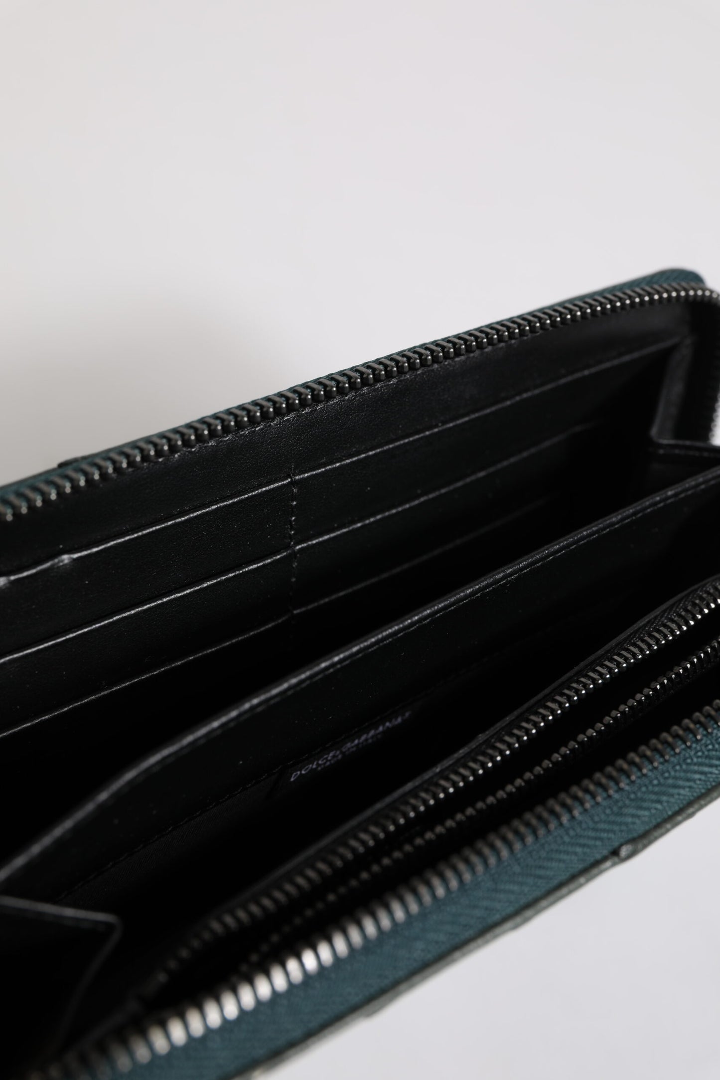 Cardholder Wallet by Dolce & Gabbana for men in ostrich leather green presents a refined silhouette, artfully capturing the essence of the Ostrich Leather Cardholder Wallet design with sophisticated card-organization zip-around coin-purse for a refined look.