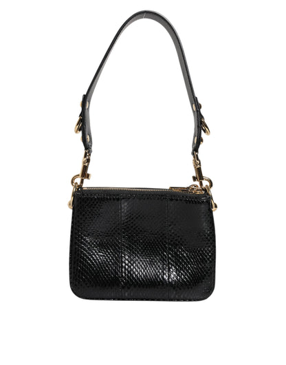 Shoulder Sling Clutch Bag by Dolce & Gabbana for women in exotic leather black & gold features a effortless chic silhouette with a secure zipper, ample , and versatile shoulder-strap, adjustable-strap & detachable-strap for a effortless chic finish.