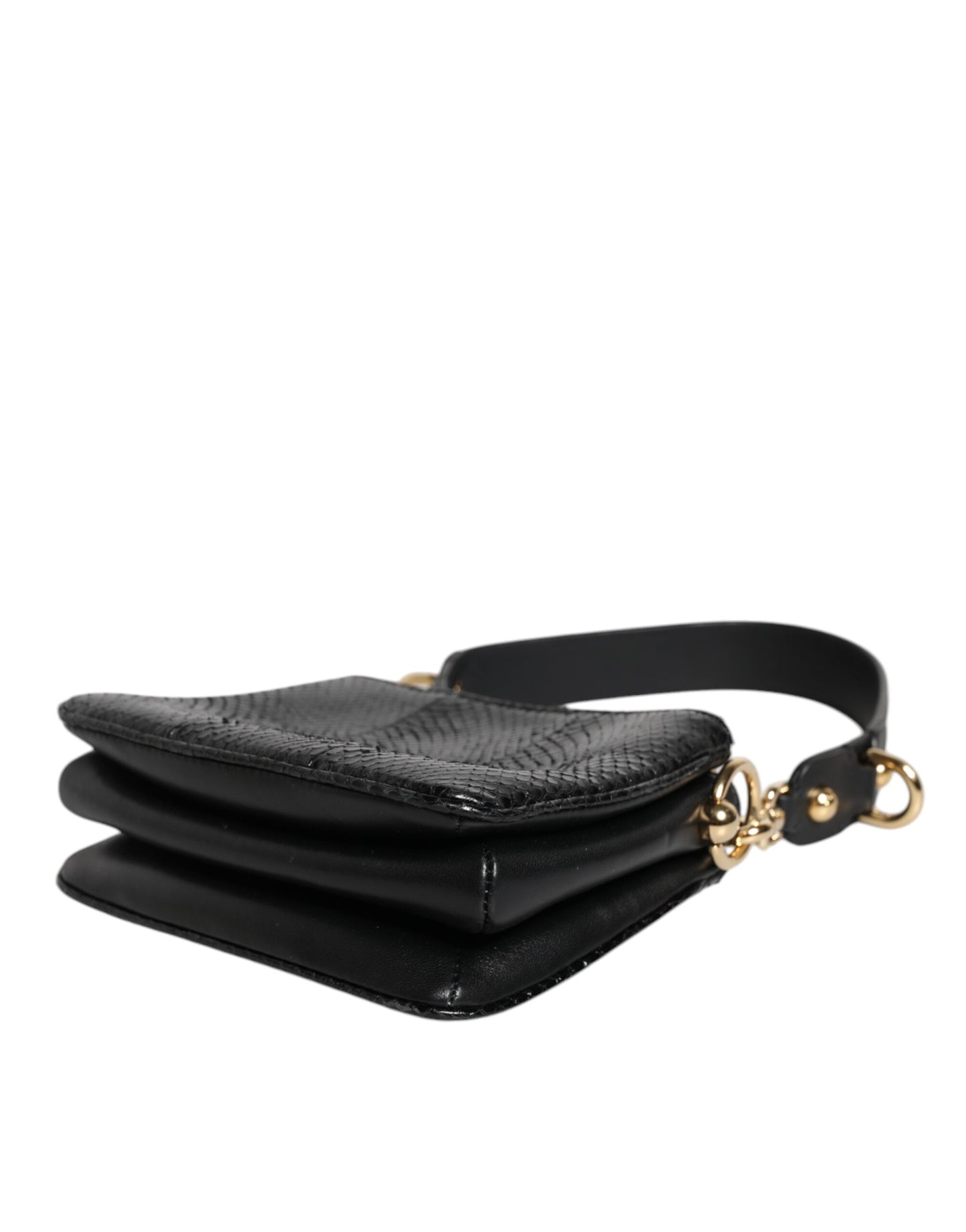 Shoulder Sling Clutch Bag by Dolce & Gabbana for women in exotic leather black & gold presents a statuesque silhouette, showcasing a secure zipper and statuesque with versatile shoulder-strap, adjustable-strap & detachable-strap for a sophisticated look.