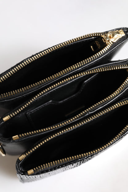 Shoulder Sling Clutch Bag by Dolce & Gabbana for women in exotic leather black & gold features a statuesque silhouette, showcasing a secure zipper and statuesque with versatile shoulder-strap, adjustable-strap & detachable-strap for a statuesque finish.