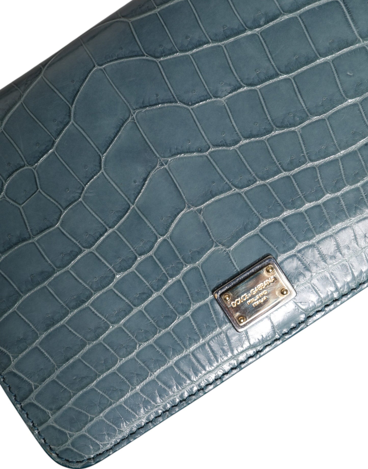 Mini Crossbody Handbag by Dolce & Gabbana for women in exotic leather black, gold & green features a versatile chic silhouette, meticulously detailed with a secure magnetic, ample internal-pockets & cardholder, and versatile crossbody-strap.