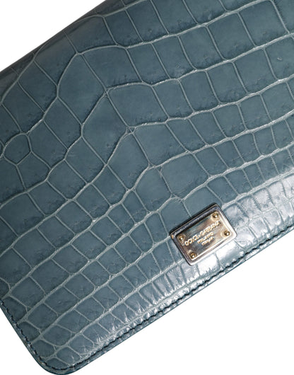 Mini Crossbody Handbag by Dolce & Gabbana for women in exotic leather black, gold & green features a versatile chic silhouette, meticulously detailed with a secure magnetic, ample internal-pockets & cardholder, and versatile crossbody-strap.