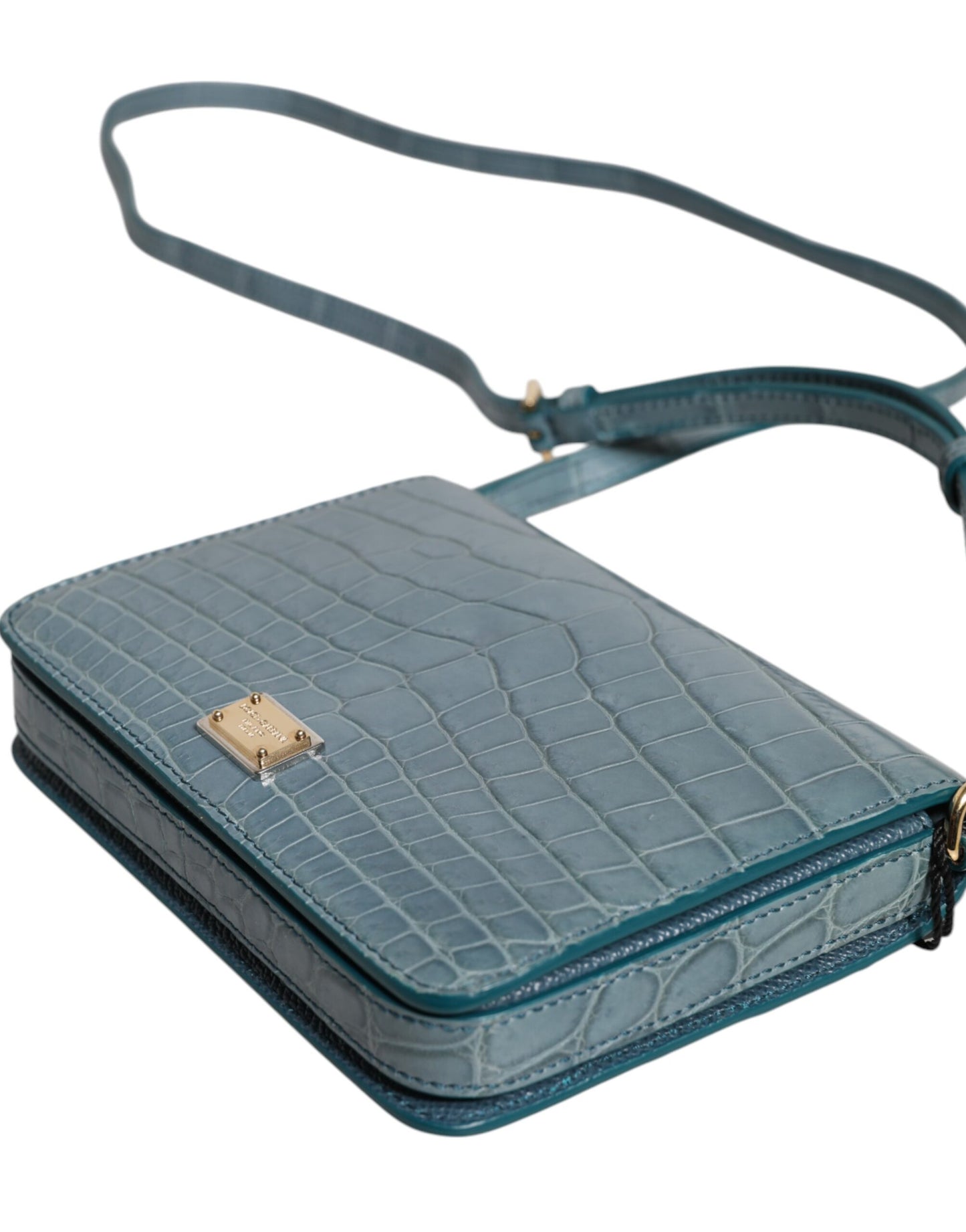 Mini Crossbody Handbag by Dolce & Gabbana for women in exotic leather black, gold & green features an multi-faceted design with a secure magnetic, ample internal-pockets & cardholder, and versatile crossbody-strap for a multi-faceted finish.