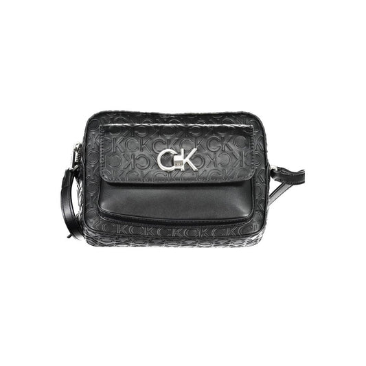 Shoulder Convertible Handbag by Calvin Klein for women in polyester black features a polished silhouette with a secure zipper, ample external-pockets & internal-pockets, and polished shoulder-strap & adjustable-strap for a sophisticated look.
