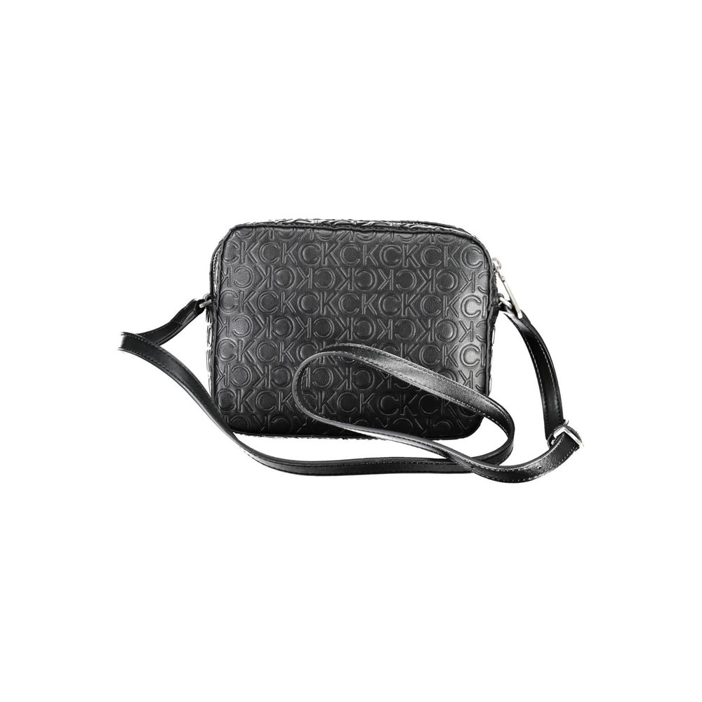 Shoulder Convertible Handbag by Calvin Klein for women in polyester black presents a exquisite silhouette, showcasing a secure zipper and organized external-pockets & internal-pockets with versatile shoulder-strap & adjustable-strap.