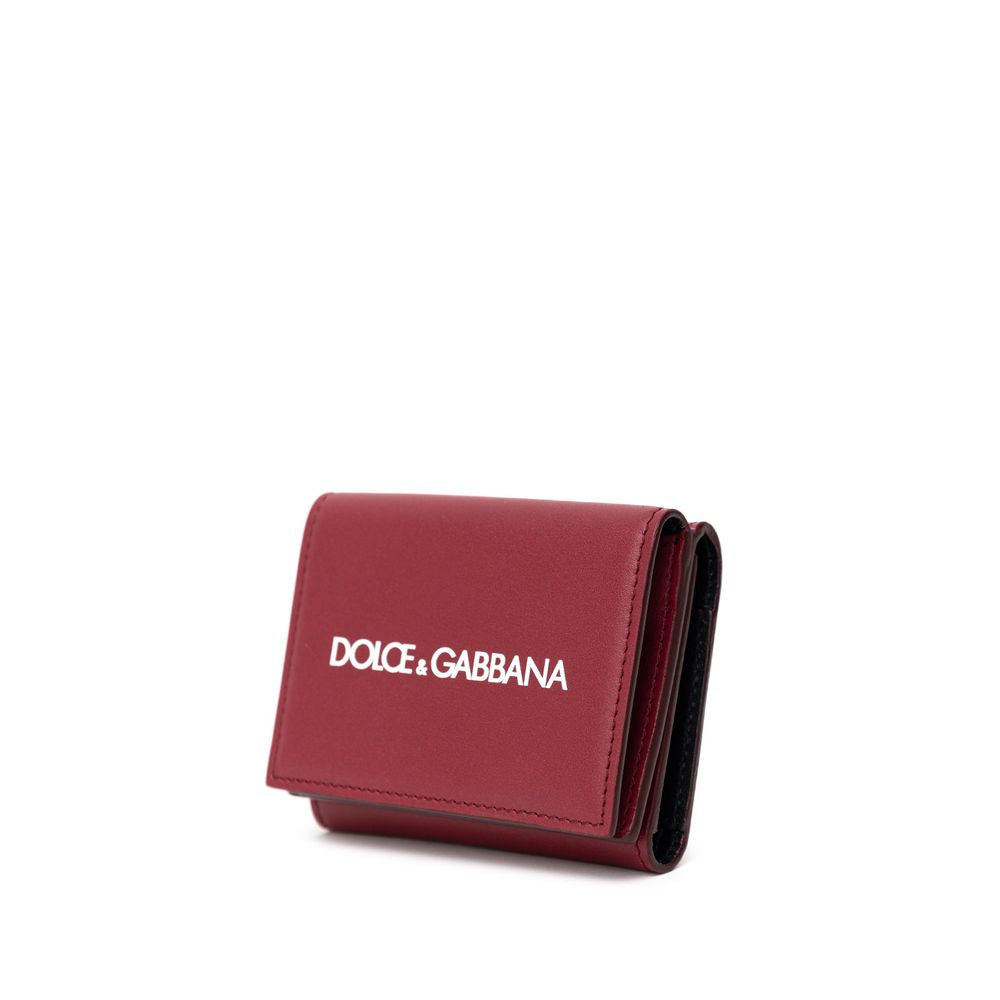 Wallet by Dolce & Gabbana for men in calfskin leather red & print presents a refined silhouette, artfully capturing the essence of the Calfskin Leather Wallet design with sophisticated coin-purse for a refined look.