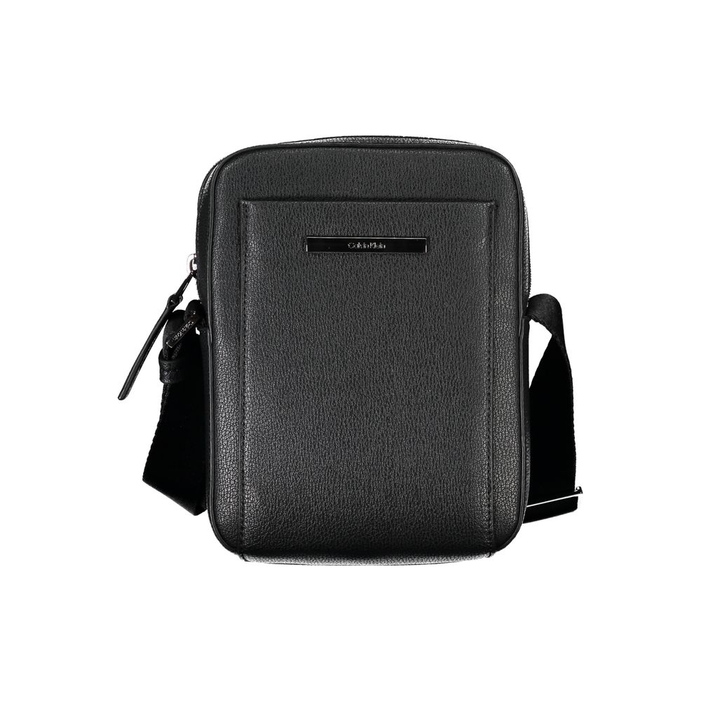 Shoulder Bag by Calvin Klein for men in polyester & polyethylene black features a statuesque silhouette, showcasing a secure zipper and statuesque external-pockets & internal-pockets with versatile shoulder-strap & adjustable-strap for a statuesque finish.