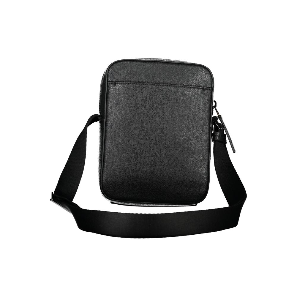 Shoulder Bag by Calvin Klein for men in polyester & polyethylene black features an effortlessly chic silhouette with a secure zipper, ample external-pockets & internal-pockets, and versatile shoulder-strap & adjustable-strap for effortlessly chic everyday luxury.