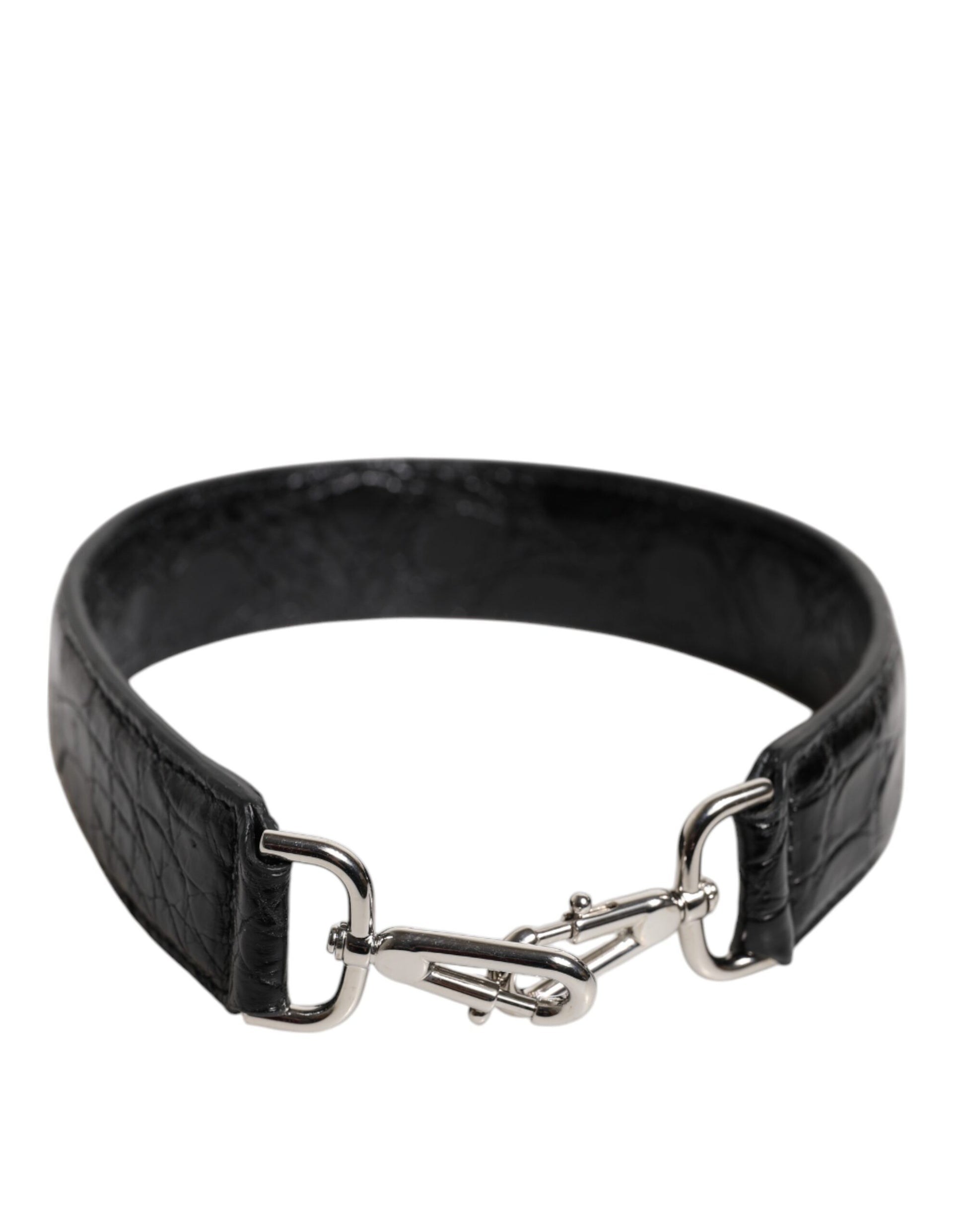 Shoulder Strap by Dolce & Gabbana for women in alligator skin leather black & silver features a dynamic silhouette, artfully enhancing the dynamic design of this Alligator Skin Leather Shoulder Strap.