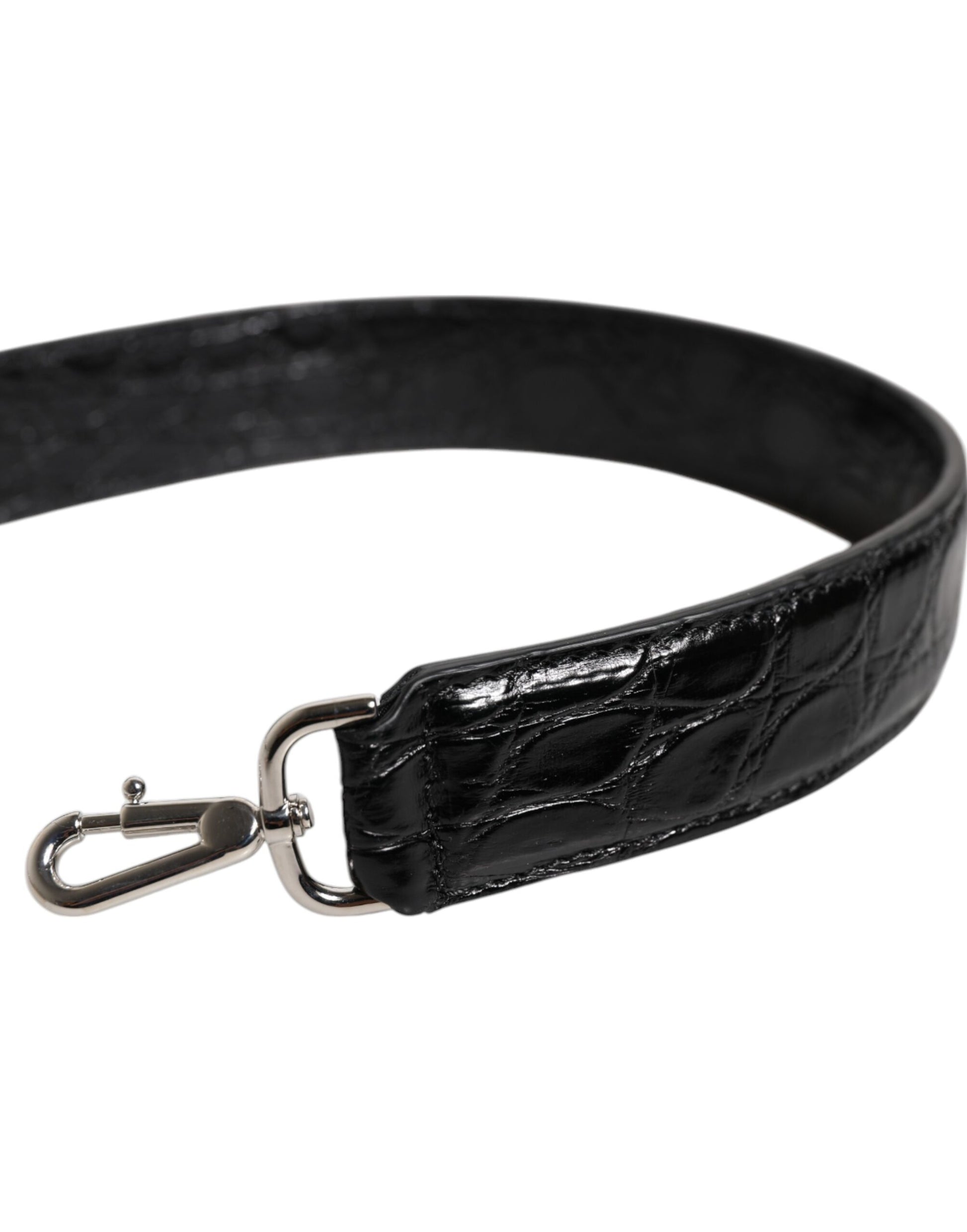 Shoulder Strap by Dolce & Gabbana for women in alligator skin leather black & silver features a contemporary design, highlighting the distinctive style of the Alligator Skin Leather Shoulder Strap with a contemporary finish.
