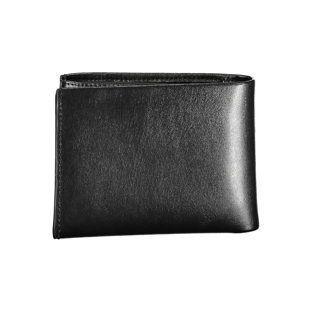 Wallet by Calvin Klein for men in leather black presents a architectural silhouette from the Leather Wallet collection, showcasing architectural rfid-protection coin-purse for a architectural finish.